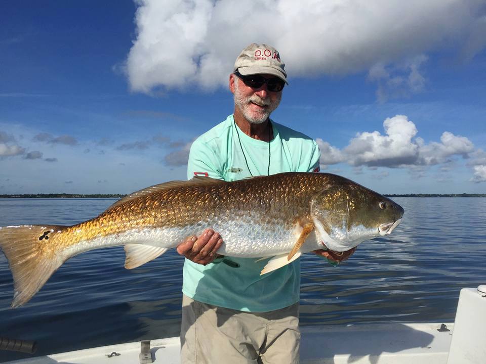 DOA Lures owner, Mark Nichols catches a beautiful redfish on his own DOA shrimp lures regularly.