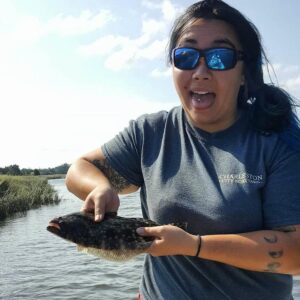 Michelle’s ( ) first flounder! Its amazing how quick she picked up fishing!! I w